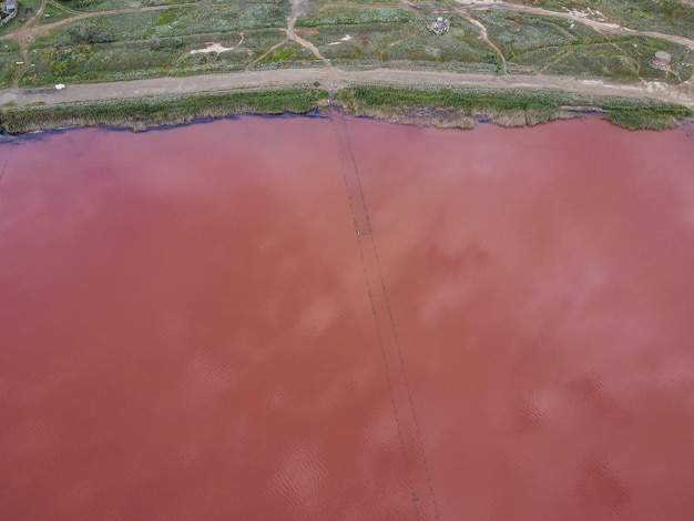 Aerial view from a drone on a pink lake outdoor