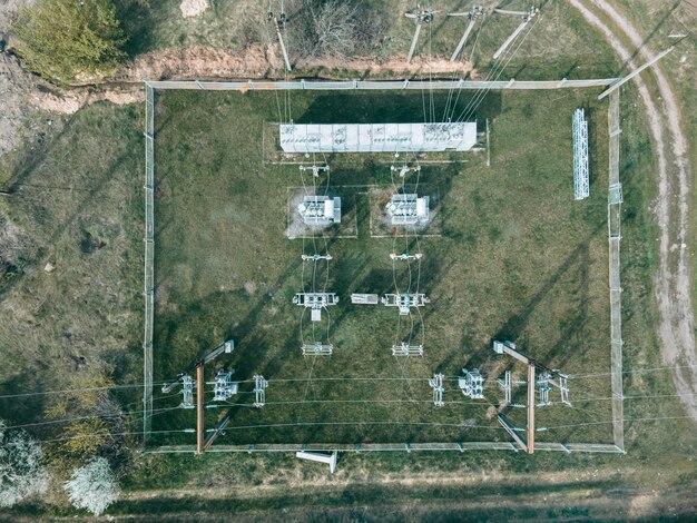 Aerial view from drone of power plant with transformers