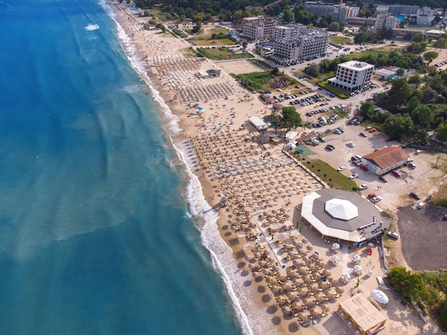 Aerial View From Flying Drone Of People Crowd Relaxing On Beach In Kranevo Bulgaria