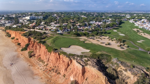 Aerial. View from the sky at the golf courses in the tourist town Vale de Lobo. Vilamoura.