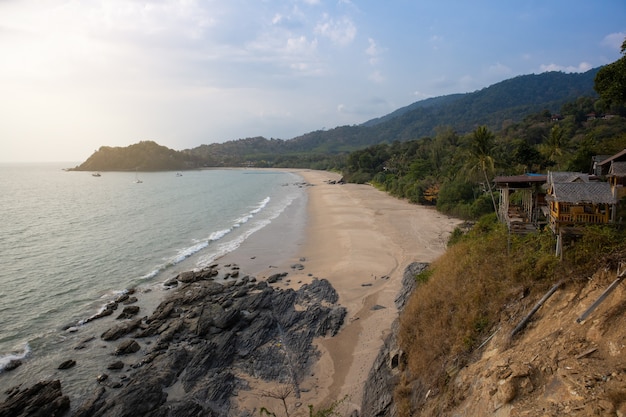 Aerial view from viewpoint. Sea and beach with blue sky background on a calm day.