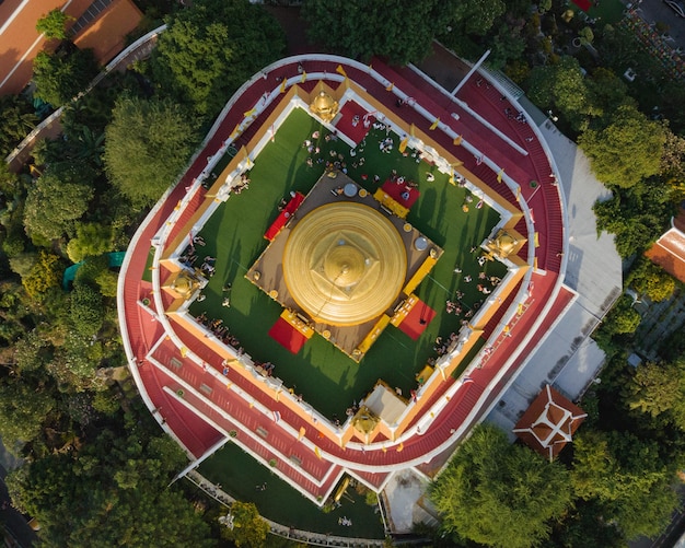 An aerial view of the Golden Mount stands prominently at Saket Temple The most famous tourist attraction in Bangkok Thailand