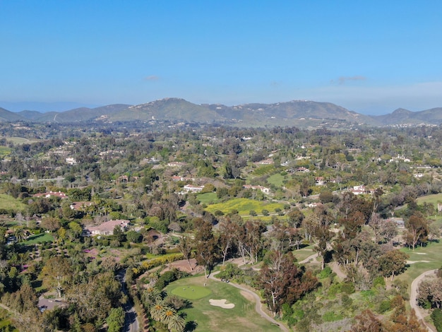 Aerial view over golf field. Large and green turf golf course in South California. USA