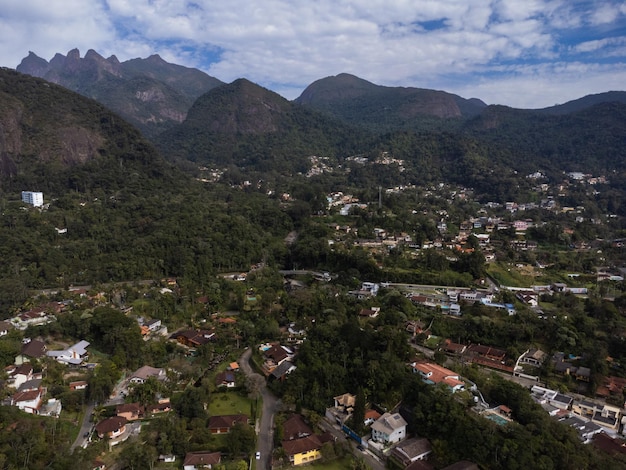 Aerial view of Granja Comary Carlos Guinle neighborhood in the city of Teresopolis Mountain region of Rio de Janeiro Brazil Drone photo Houses lake and hills and mountains