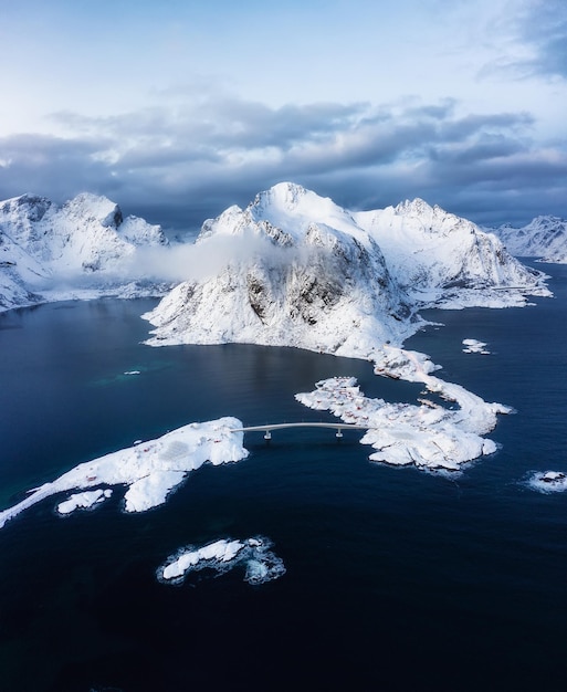 Aerial view on the Hamnoy village Lofoten Islands Norway Landscape in winter time during blue hour Mountains and water Travel image