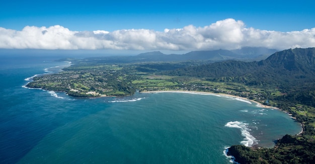 Aerial view of Hanalei Bay and Princeville on hawaiian island of Kauai from helicopter flight