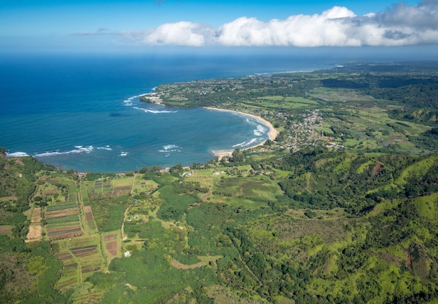 Aerial view of Hanalei Bay and Princeville on hawaiian island of Kauai from helicopter flight