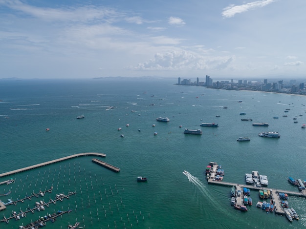 Aerial View on Harbor with Luxury Yachts - Sailboat harbor, many beautiful moored sail yachts in the sea port WITH blue sky clouds.