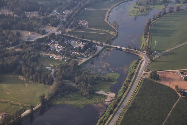 Aerial view of homes and farm fields in Fraser Valley