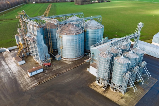 Aerial view of a huge agroindustrial complex with silos and grain drying line