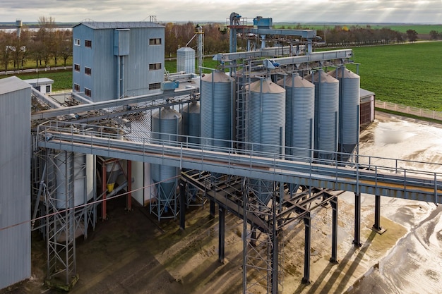 Aerial view of a huge agroindustrial complex with silos and grain drying line