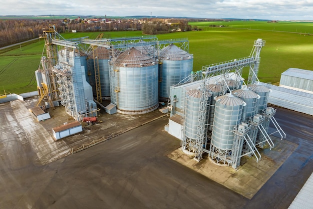 Aerial view of a huge agroindustrial complex with silos and grain drying line