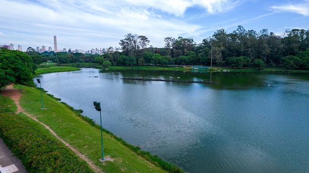 Aerial view of Ibirapuera Park in So Paulo, SP. Residential buildings around. Lake in Ibirapuera