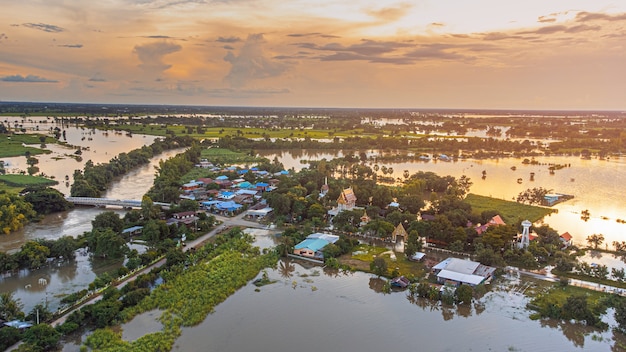 Aerial view images from drone of Community and agricultural regions are being flooded