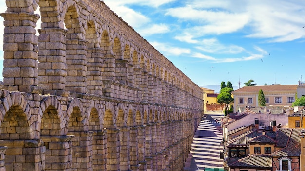 Aerial view of the impressive Roman aqueduct of Segovia at dawn Spain