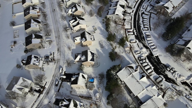 Aerial view individual houses buildings complex in residential home neighborhood roof houses covered