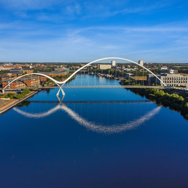 Aerial view of the Infinity Bridge spanning the river Tees in Stockton United Kingdom