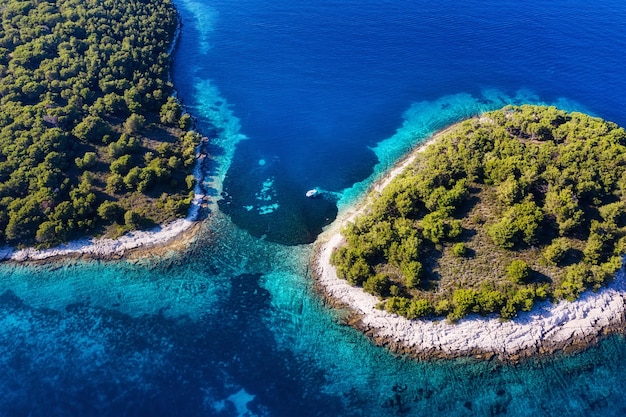 Aerial view on islands on sea Azure water and islands with trees Seascape from air at the summer time Travel image