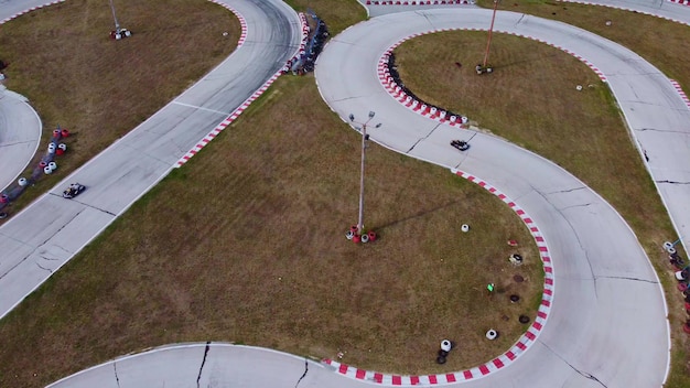 Aerial view of the karting track during the race Several racing karts compete on a special track