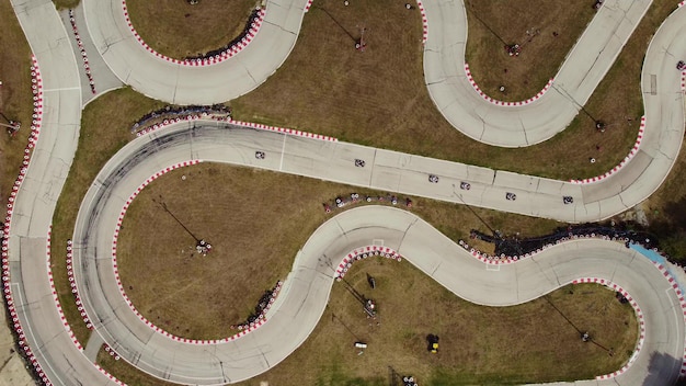 Aerial view of the karting track during the race Several racing karts compete on a special track