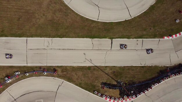 Aerial view of the karting track during the race Several racing karts compete on a special track