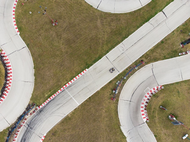 Aerial view of the karting track during the race Several racing karts compete on a special track