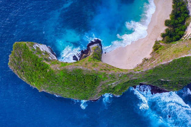 Aerial view of Kelingking Beach in Nusa Penida island, Bali in Indonesia.