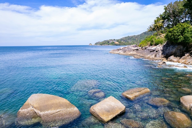 Aerial view landscape nature view of sea crashing waves on seashore Rocky coast at Phuket Thailand