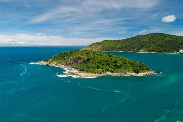 Aerial view landscape of small island in tropical sea against blue sky background Amazing small island at Phuket Thailand.