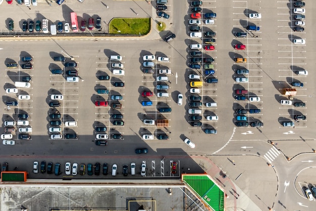 Aerial view on large open air parking lot for cars for residents of area