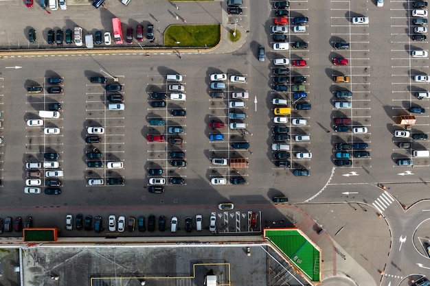 Aerial view on large open air parking lot for cars for residents of area