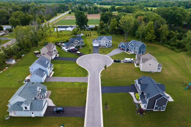 Photo aerial view of large private homes in rochester ny residential area new family houses as example of real estate development in american suburbs