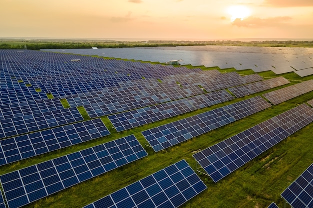 Aerial view of large sustainable electrical power plant with many of solar photovoltaic panels