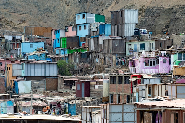 Aerial view of Lima poor districts, Lima houses view from Morro Solar, Peru