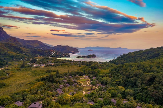 Aerial view of luxury villas on mahe island seychelles at sunset