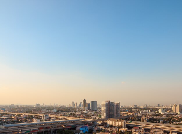 Aerial view of the metropolis at sunset sky