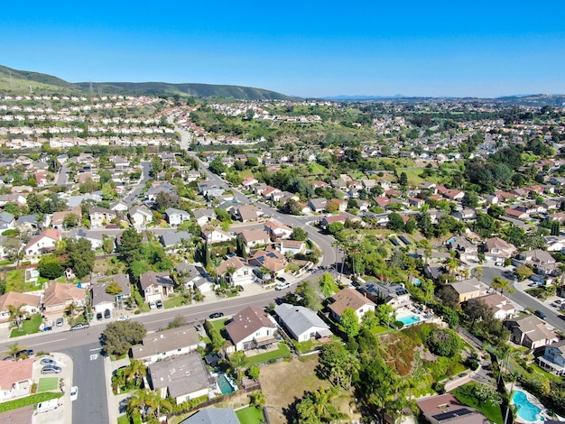 Aerial view of middle class subdivision neighborhood with residential condos and houses in San Diego