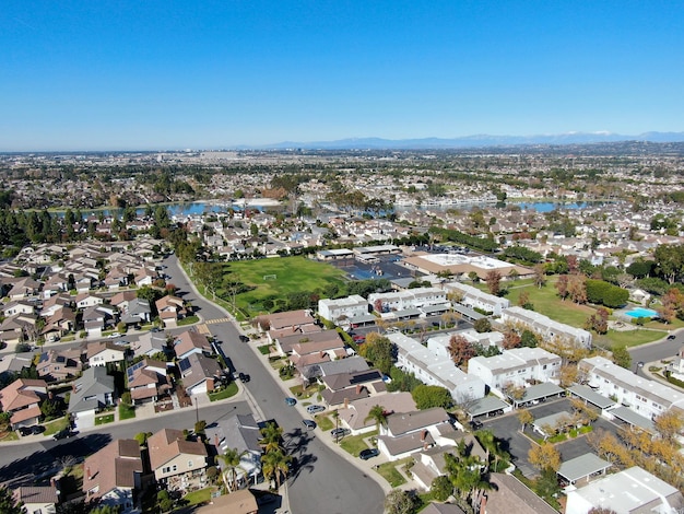 Aerial view of middle class suburban neighborhood with houses next to each other in Irvine Californ