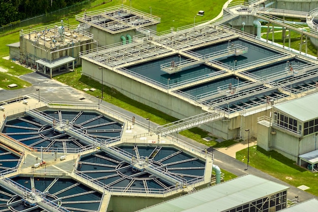 Aerial view of modern water cleaning facility at urban wastewater treatment plant Purification process of removing undesirable chemicals suspended solids and gases from contaminated liquid