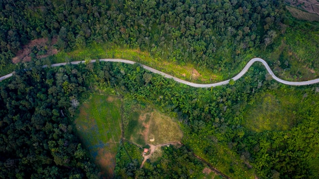 Aerial view mountain paths rural road between the city and valley in at doi chang chiang rai thailand