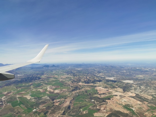 Aerial view of mountains and wind power propellers