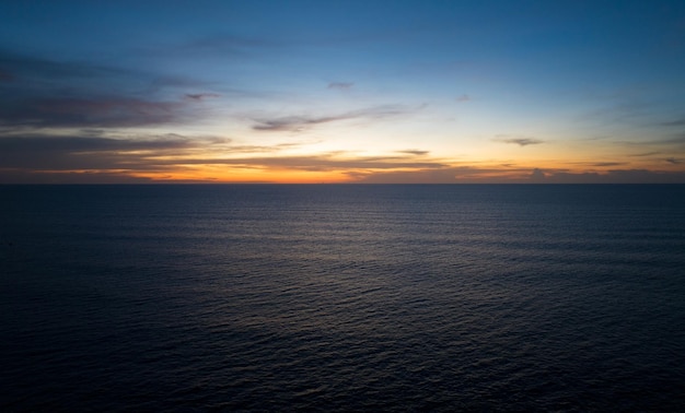 Aerial view Nature beautiful Light Sunset or sunrise over sea surface Colorful Dramatic majestic scenery Sky with Amazing clouds in sunset sky cloud backgroundHigh angle view