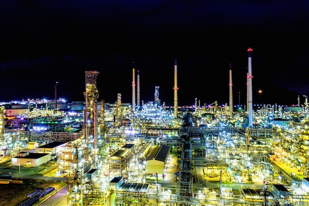 Aerial view. Oil refinery factory and oil storage tank at night