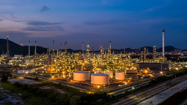 Aerial view oil refinery plant factory at twilight.