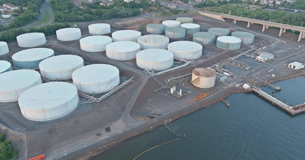 Aerial view oil refinery with a large oil storage tank