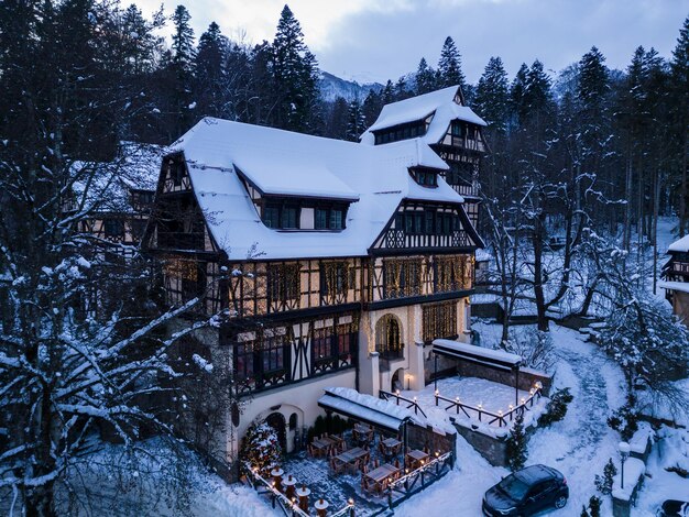 Aerial view of old castle in winter Sinaia Romania