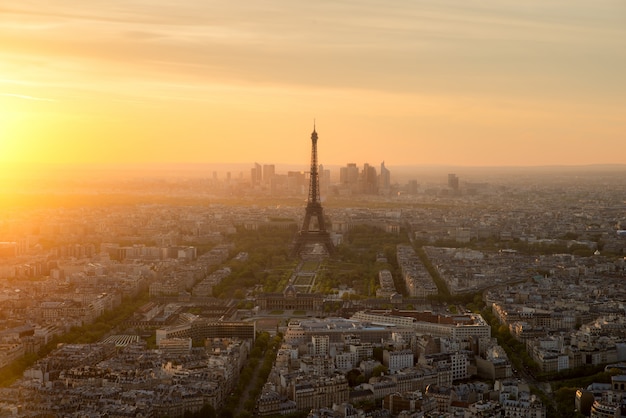 Aerial view of Paris and Eiffel tower at sunset in Paris, France.