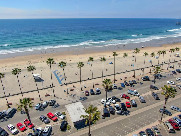 Aerial view of parking lot with cars in front of the beach ocean, La Jolla. San Diego