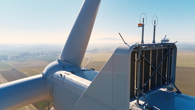 Aerial view of part of windmill turbine in countryside Green energy