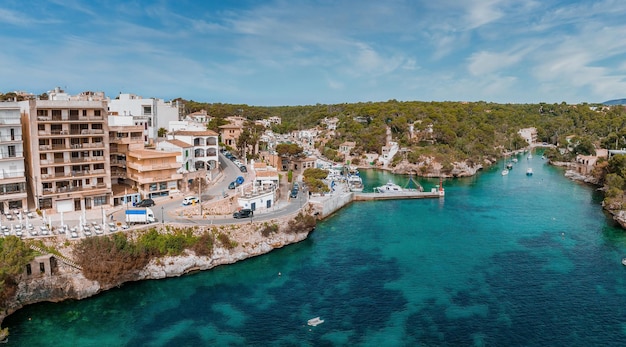 Photo aerial view of the porto colom fishing village in majorca